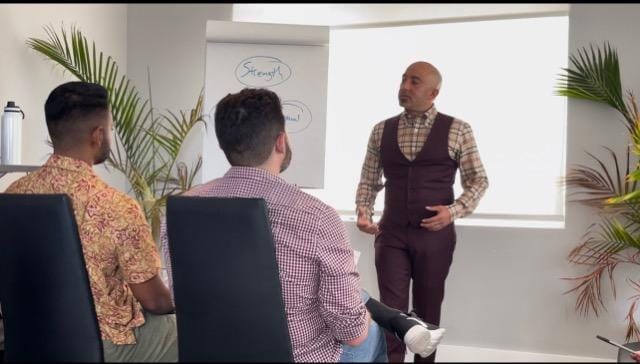 Ike Shehadeh teaching a business masterclass to a room of entrepreneurs